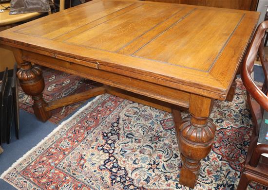 A Jacobean style oak drawleaf refectory table W.270cm (extended)